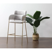 Tabouret haut rembourré avec pieds dorés